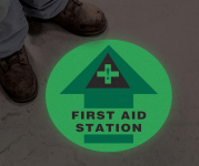 Accuform MFS780 Glow-In-The-Dark Slip-Gard Floor Sign: First Aid Station (0)