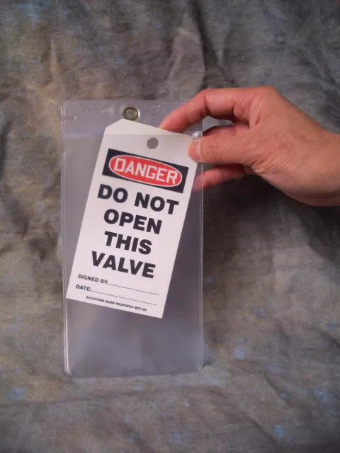 Accuform DTH719 Tag Pouch: Clear Plastic Overflap