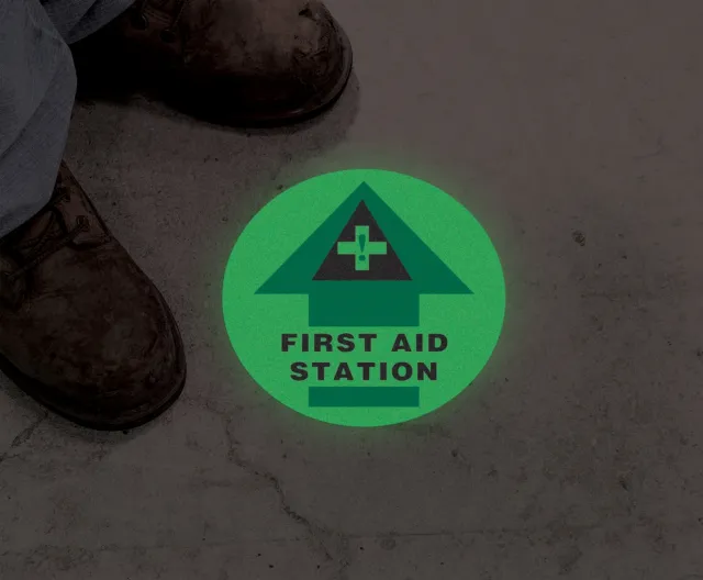 Accuform MFS891 Glow-In-The-Dark Slip-Gard Floor Sign: First Aid Station